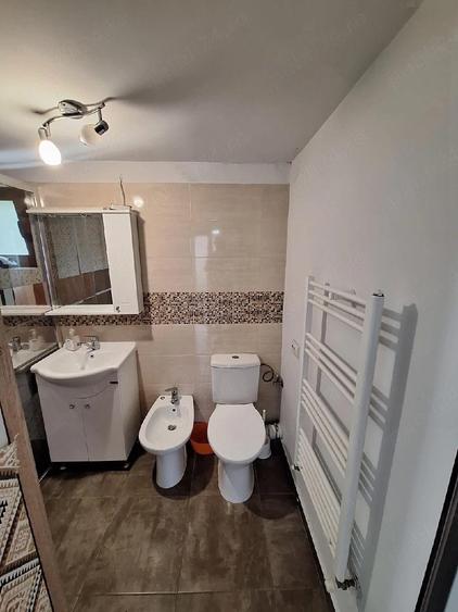 Casă cu 2 camere cu Teren 100 Mp în Central