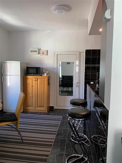 Apartament cu 2 camere semidecomandat, mobilat în Centrul Istoric