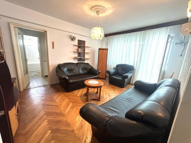 Apartament cu 2 camere semidecomandat, mobilat în Central