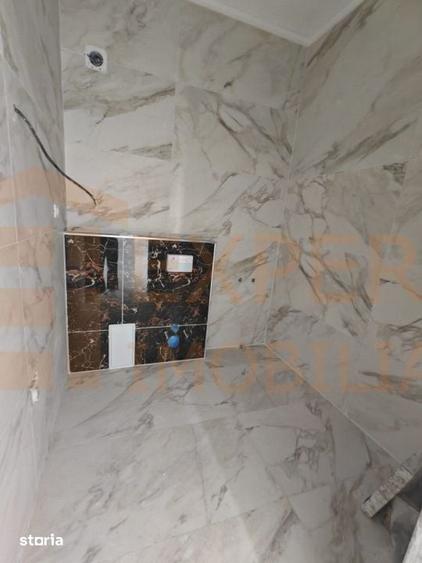 Casă cu 4 camere cu Teren 398 Mp în Central