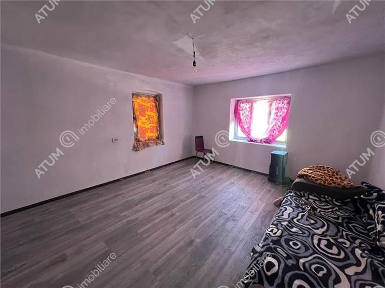 Casă individuală cu 5 camere cu Teren 489 Mp în Central