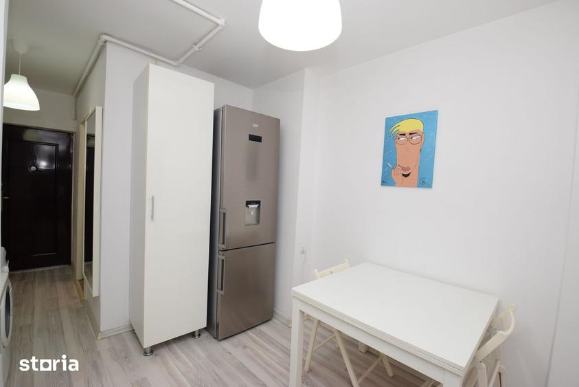 Garsonieră decomandată în Titan