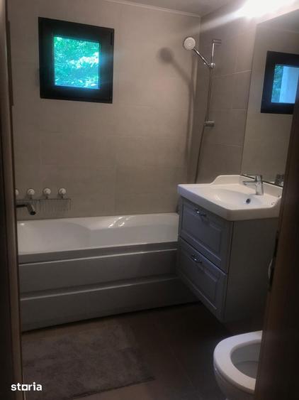 Apartament cu 3 camere semidecomandat în Rahova