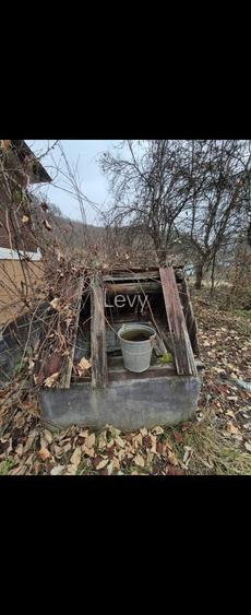 Teren 20 de ari/2000mp cu 2 case batranesti de vanzare
