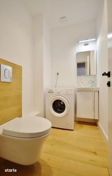 Apartament cu 3 camere semidecomandat în Gara de Nord
