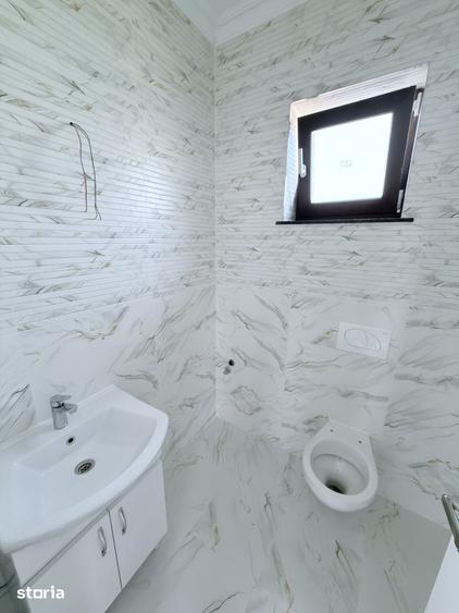 Casă cu 4 camere cu Teren 300 Mp în Central