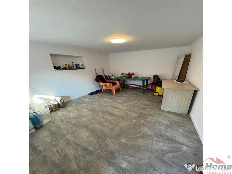 Cladire cu 3 apartamente in suprafata totala construita de 5 - 8
