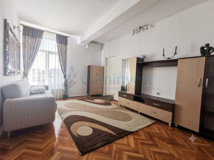 Apartament cu 2 camere semidecomandat, mobilat în Central
