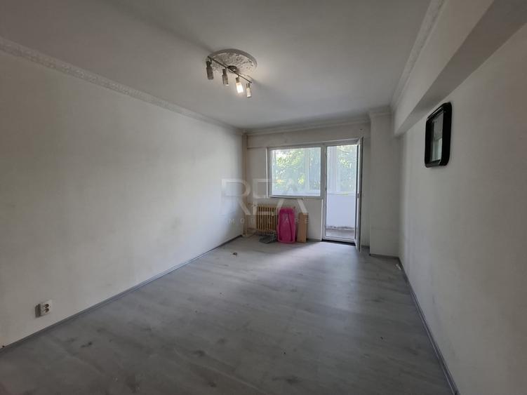 Apartament cu 3 camere semidecomandat în Veteranilor