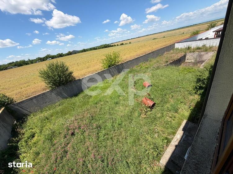 Casă cu 6 camere cu Teren 1000 Mp în Butimanu