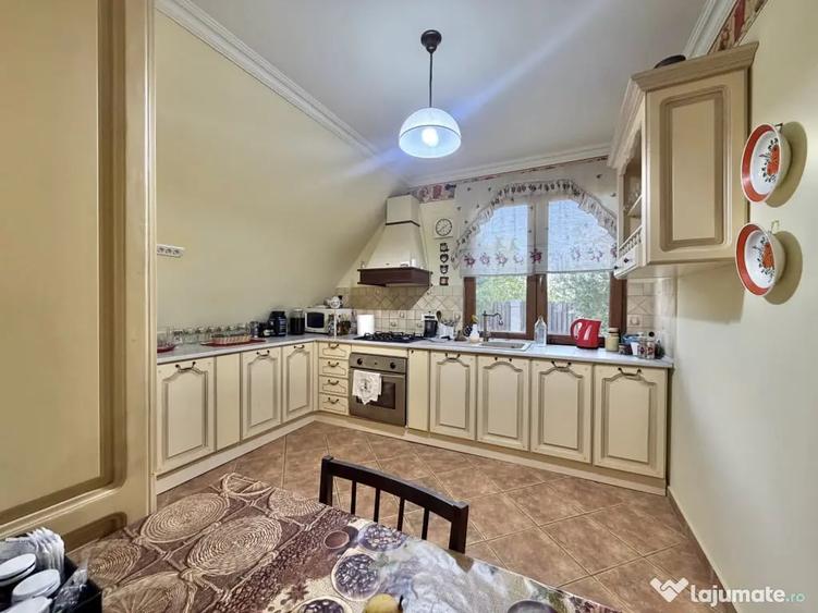 Casă cu 4 camere cu Teren 1050 Mp în Sânmihaiu Român