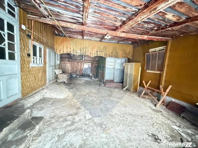 Casă cu 4 camere cu Teren 694 Mp în Central