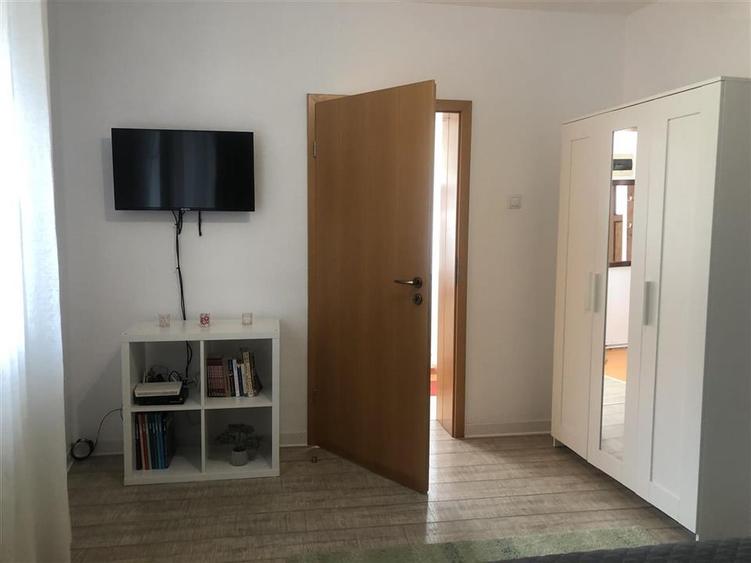 Casă individuală cu 2 camere cu Teren 100 Mp în Schei