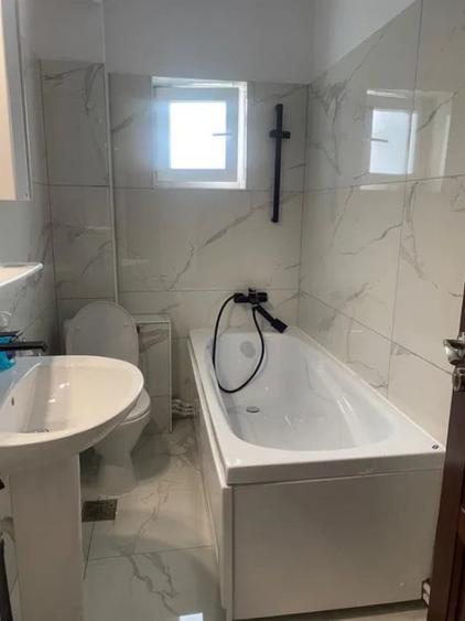 Apartament cu 2 camere decomandat în Podul de Fier