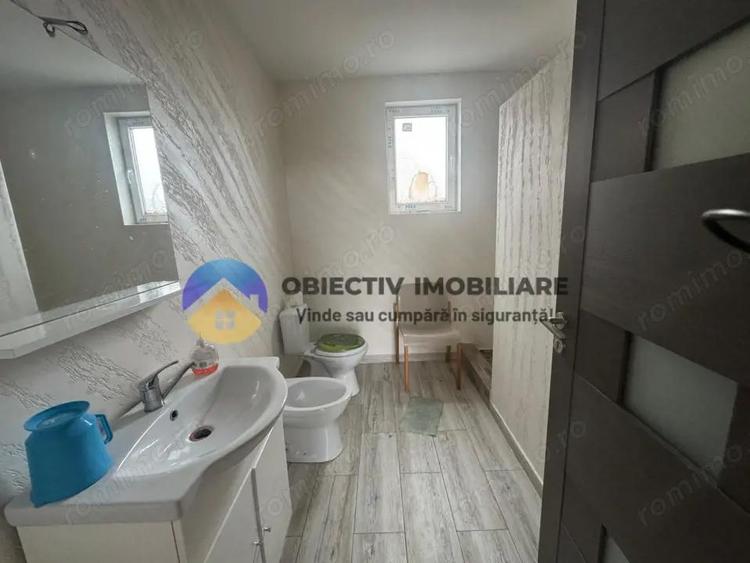 Casă cu 4 camere cu Teren 1800 Mp în Grumăzești