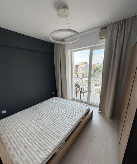 Apartament cu 3 camere decomandat, mobilat în Romană