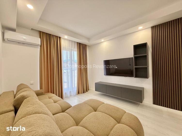 COSMOPOLIS - Apartament cu 3 camere si gradina, mobilat si utilat.