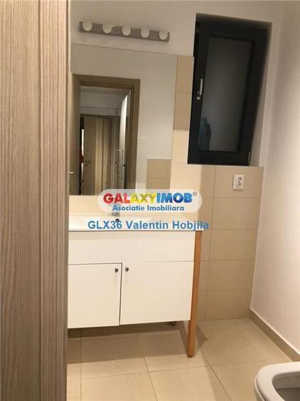 Apartament cu 3 camere semidecomandat, mobilat în Băneasa