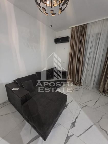 Apartament cu 2 camere semidecomandat, mobilat în Giroc