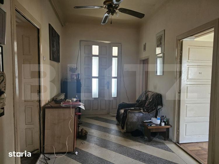 Casă cu 4 camere cu Teren 372 Mp în Central