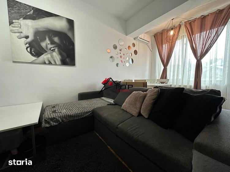 Apartament cu 2 camere, mobilat în Bucium