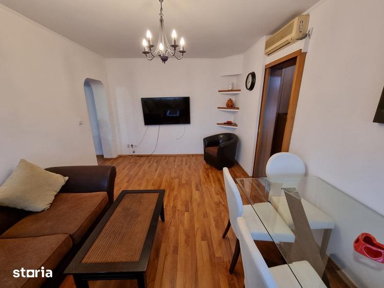 Apartament cu 3 camere semidecomandat în Dorobanți