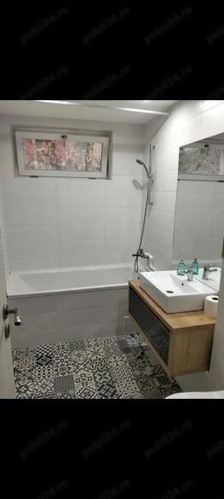 Apartament cu 3 camere semidecomandat în Nicolae Titulescu