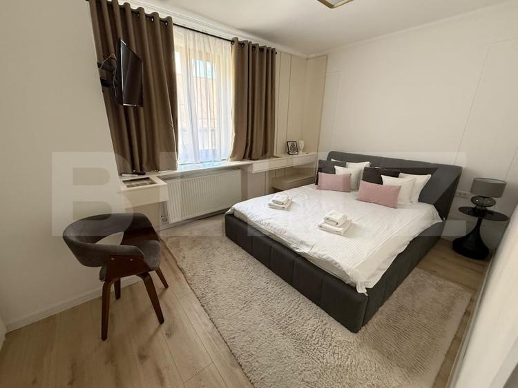 Apartament cu 3 camere semidecomandat, mobilat în Central