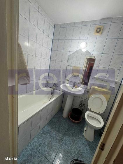 Apartament cu 3 camere semidecomandat în Ozana