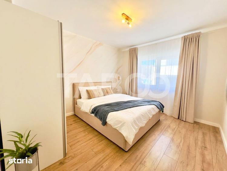 Apartament spatios - intabulat - mobilat si utilat - parcare privata - 12