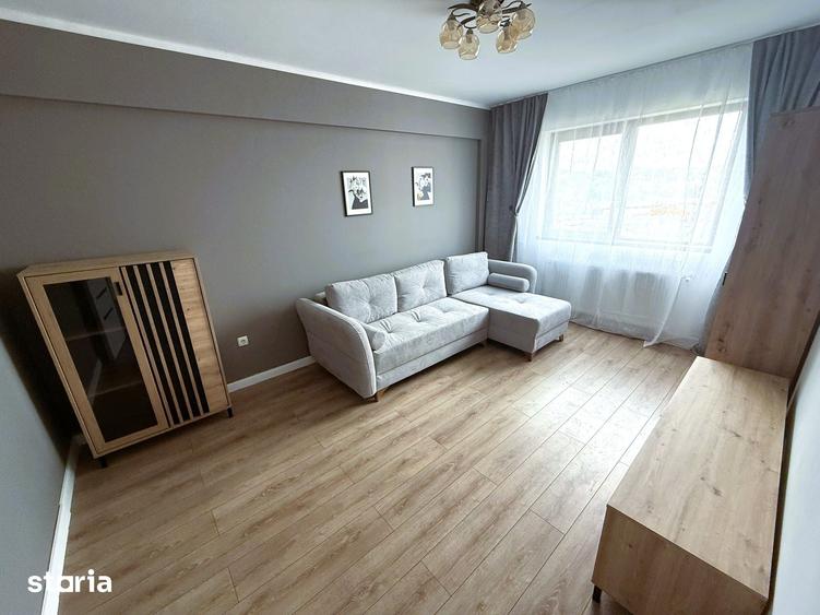 Apartament cu 3 camere decomandat în Bucium