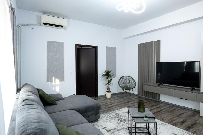 Apartament cu 3 camere semidecomandat, mobilat în 9 Mai