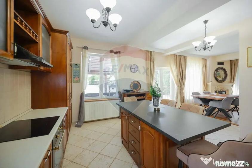 Casă cu 5 camere cu Teren 1000 Mp în Sânmartin