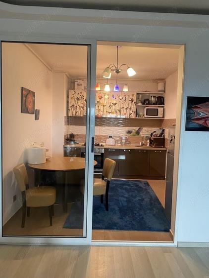 Apartament cu 2 camere decomandat în Tractorul