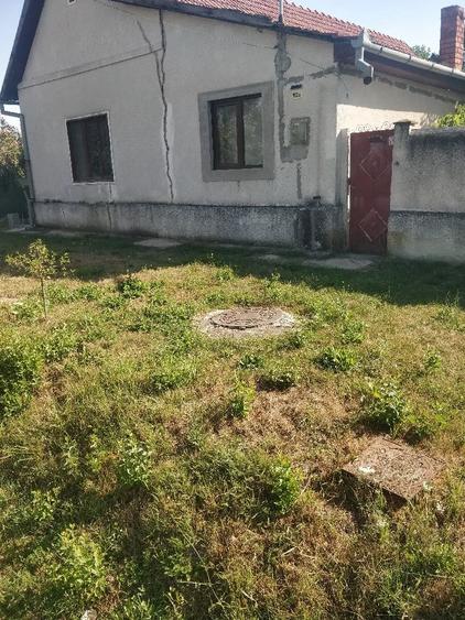 Casă cu Teren 1437 Mp în Central