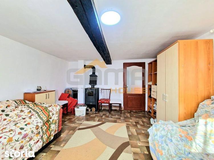 Casă cu 2 camere cu Teren 1464 Mp în Tauț