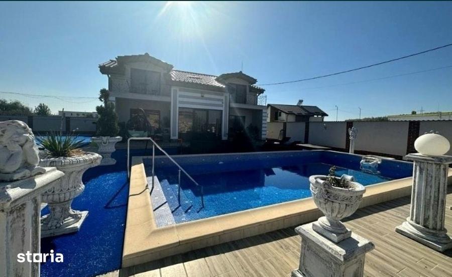 Casă cu 4 camere cu Teren 1000 Mp în Podari