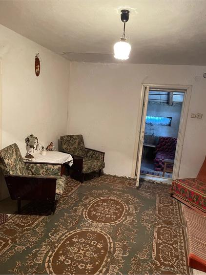 Casă cu Teren 970 Mp în Central