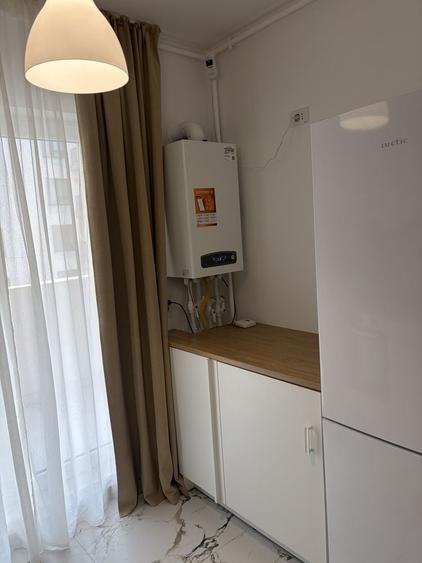 Apartament cu 2 camere semidecomandat, mobilat în Central