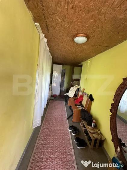 Casă cu 3 camere cu Teren 1500 Mp în Bucium