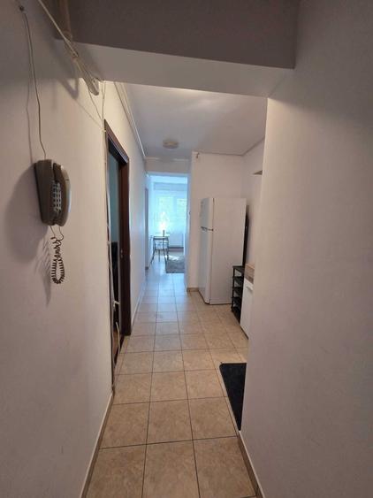 Inchiriez apartament mobilat, situat pe Bulevardul Carol, aproape de Universitate, la etajul 4/7 - 2