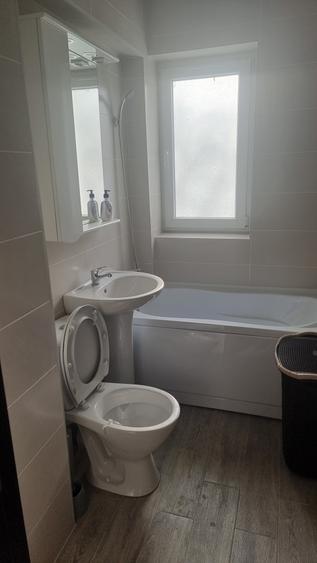 Apartament cu 2 camere semidecomandat, mobilat în Central