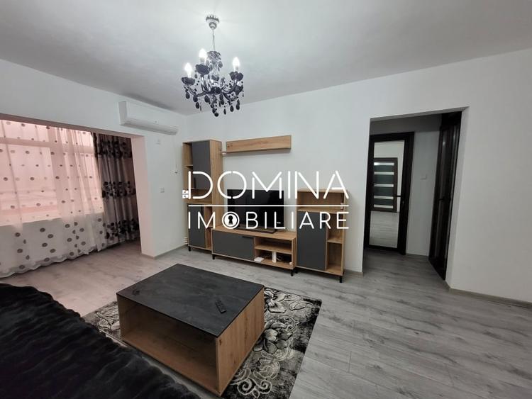 Apartament cu 2 camere semidecomandat, mobilat în Central