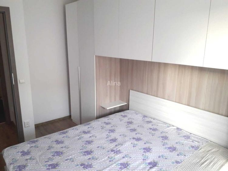 P. F. inchiriez apartament o camera in Magnolia cu loc de parcare