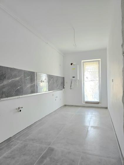 Apartament cu 2 camere decomandat în Ozana