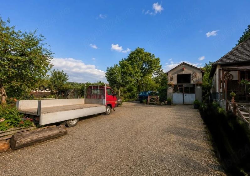 Casă cu Teren 1000 Mp în Central