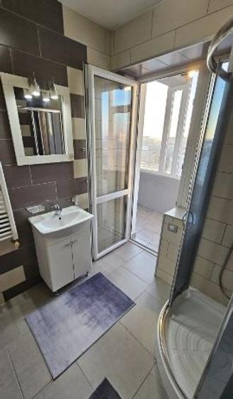 Apartament cu 2 camere semidecomandat, mobilat în Văcăresti