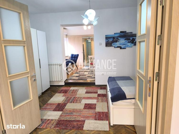 Apartament cu 3 camere semidecomandat, mobilat în Central