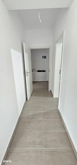 Apartament cu 3 camere decomandat în Tractorul