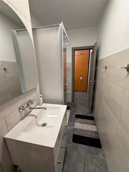 Apartament cu 2 camere semidecomandat, mobilat în Podu Roș